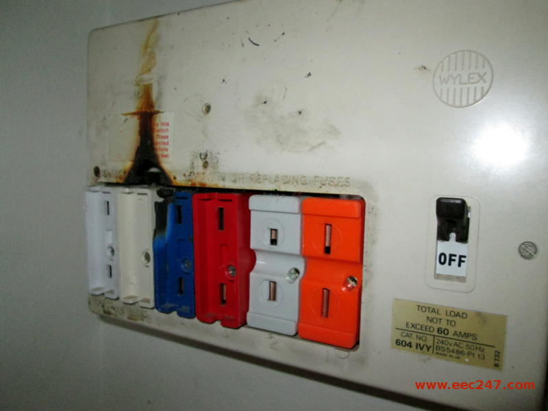 A real customers fusebox showing signs of starting a fire