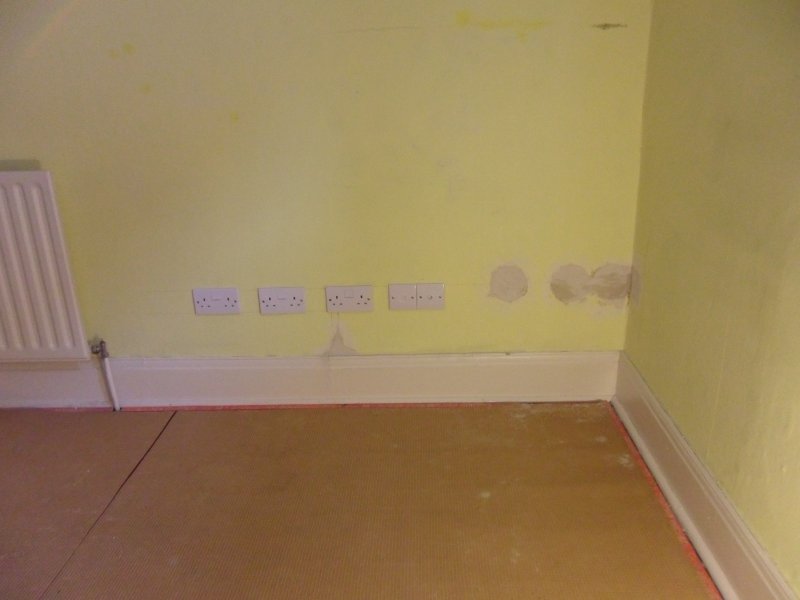 Three 13A double sockets, telephone point and TV outlet installed in home office, ready for decorating
