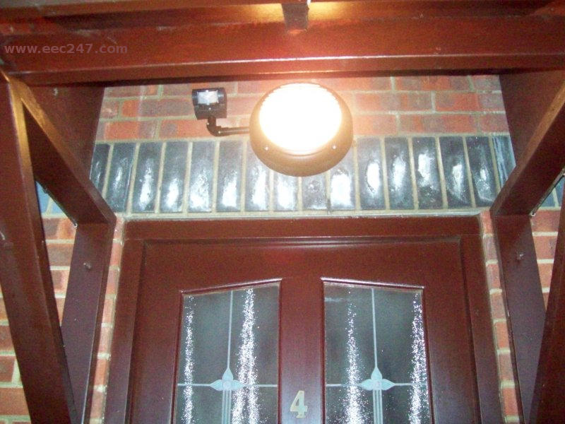 Porch light controlled by PIR mounted remotely to avoid triggering by passing traffic