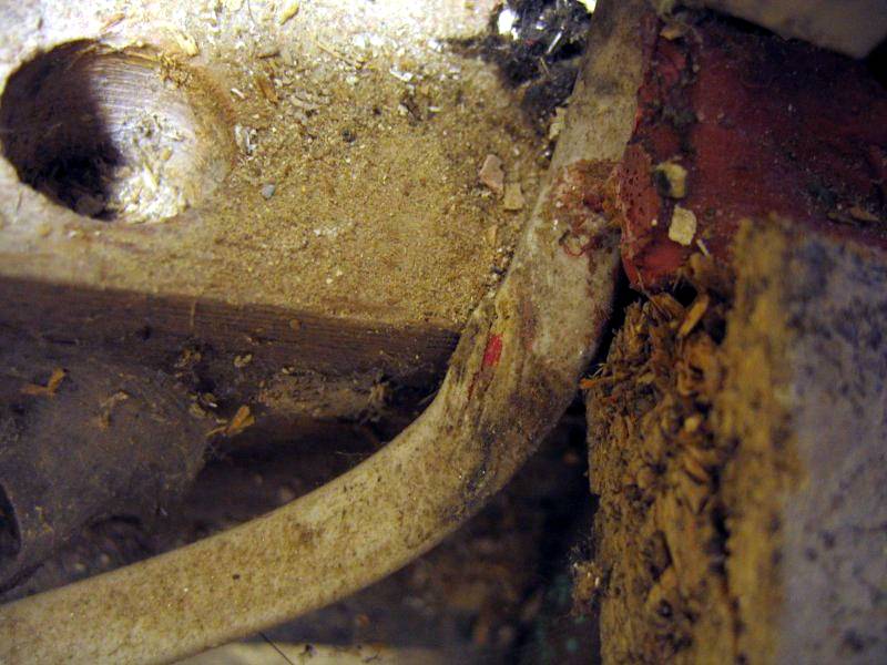 Cable damaged by trailing over joists and nailing floorboards down