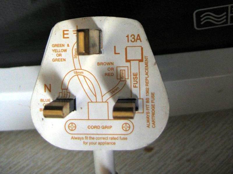 Plug with wiring instructions card still attached
