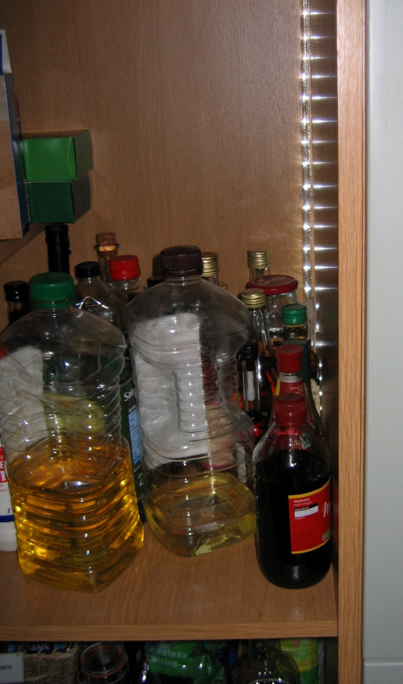 Lights in the corners help flood the cupboard as it gets filled from the supermarket