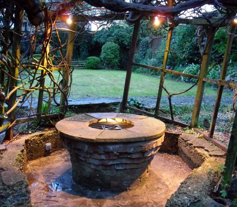 The full effect on a rainy evening with well and canopy lights on