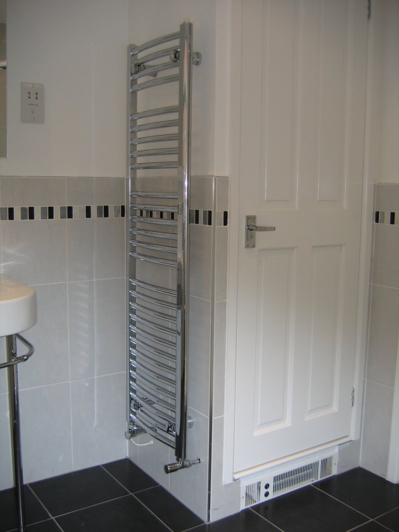Shaver socket, electrically heated towel rail and plinth heater