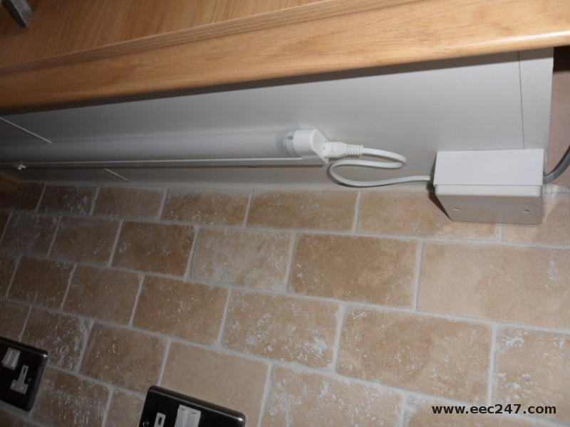 Replace kitchen under cupboard fluorescent light and tidy up wiring