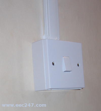 Surface Fixed light switch with cable in trunking
