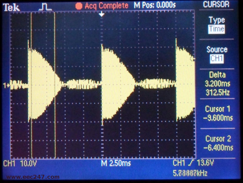 Photograph of a leading edge dimmer signal through an electronic transformer with the dimmer set to mid position